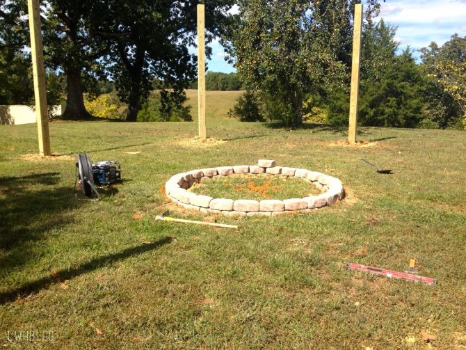 Stones placed in a circular fashion to begin forming a fire pit